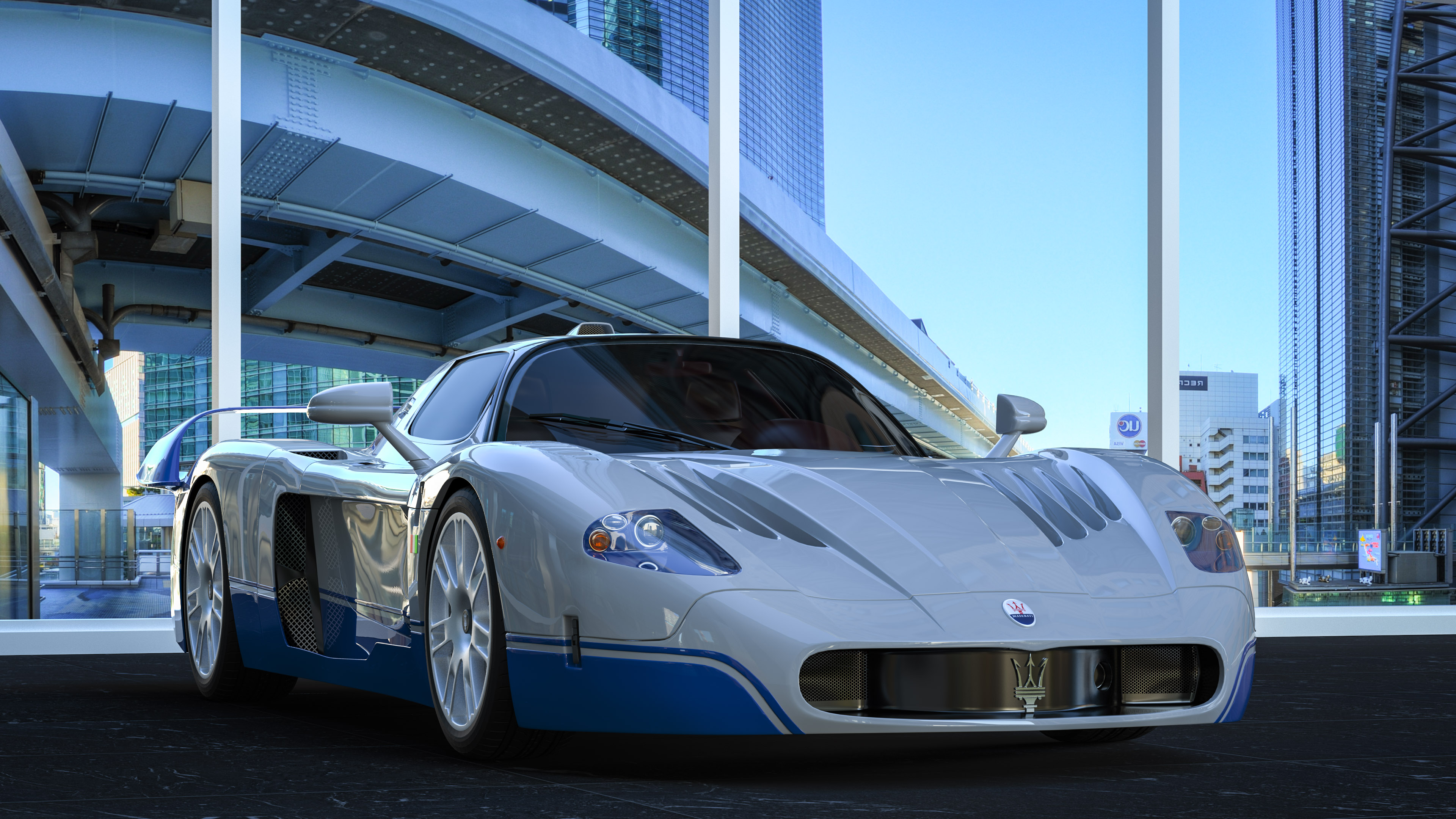 Among our top car wallpapers, the Maserati MC12 stands out, a testament to elegance and speed, perfect for those who appreciate the finer things in automotive design.