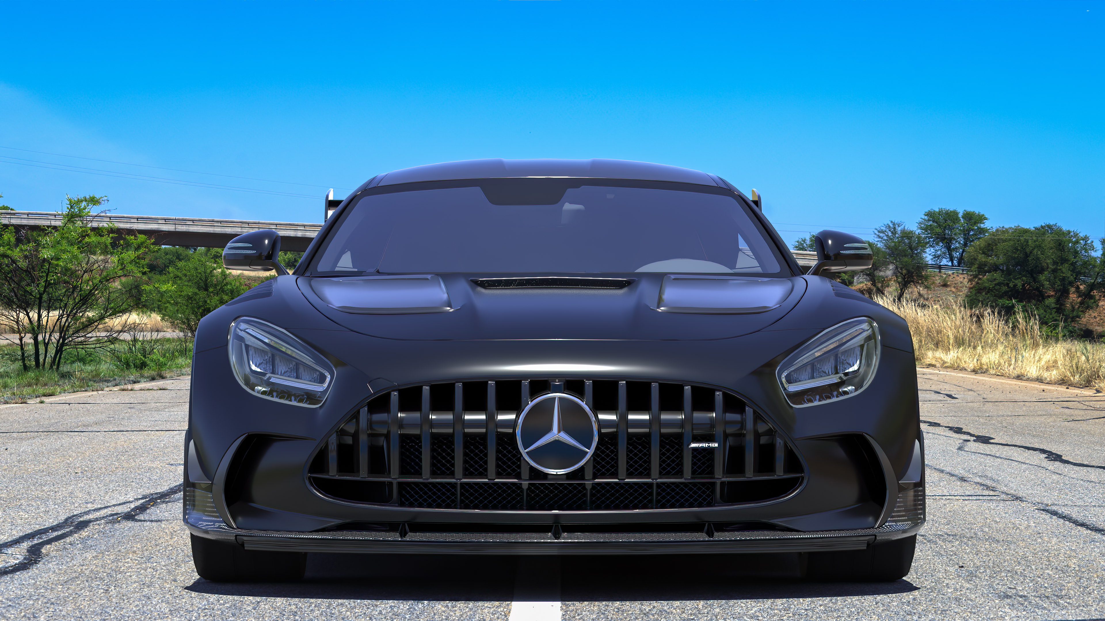 Experience the luxury of the black Mercedes AMG GT with our 4K wallpaper to download, a testament to German engineering and style.