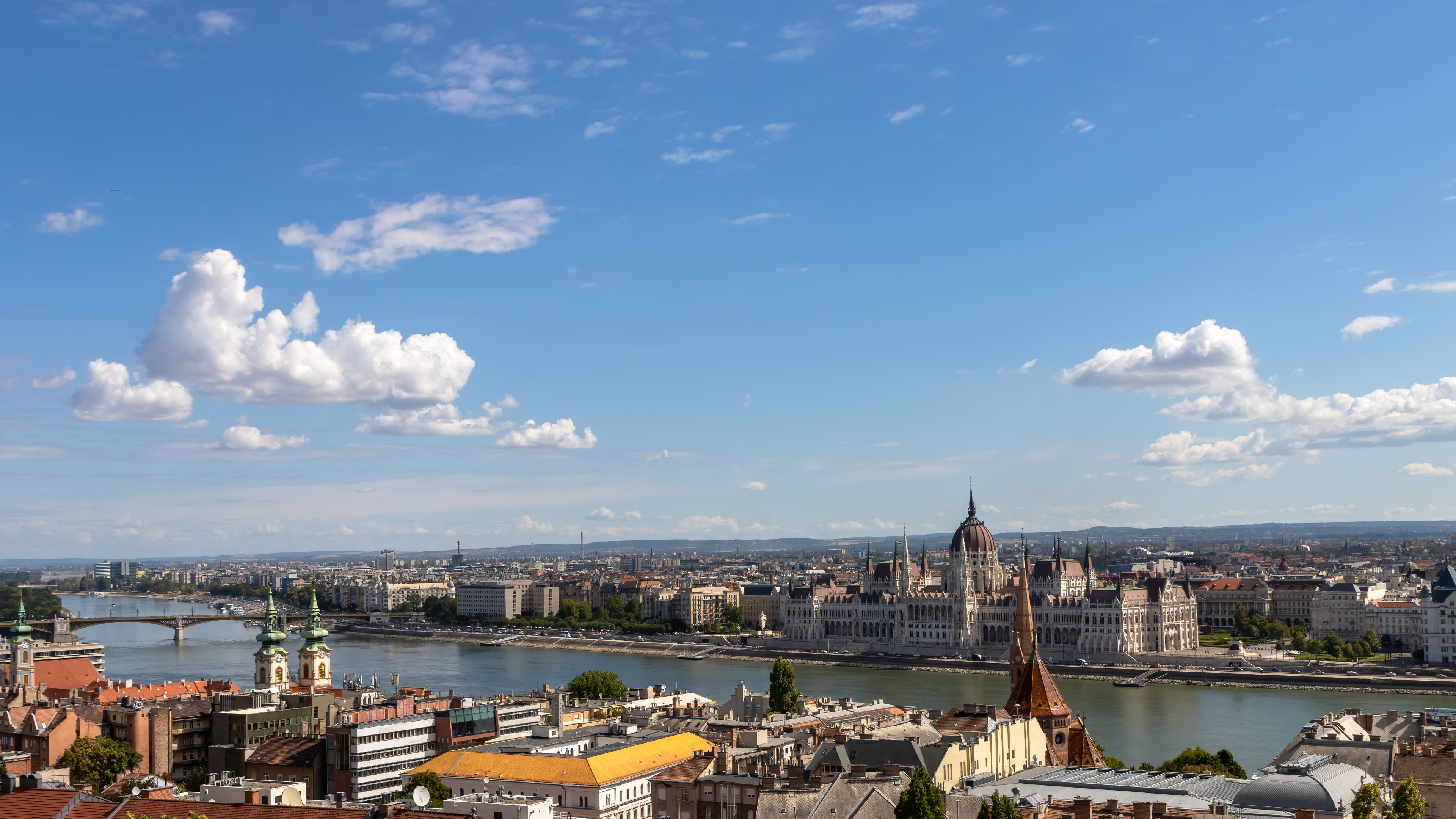 Experience the breathtaking beauty of Budapest's skyline with these stunning wallpapers. Perfect for anyone who wants to bring the city's beauty into their home or office. Download now and make your screen come alive!