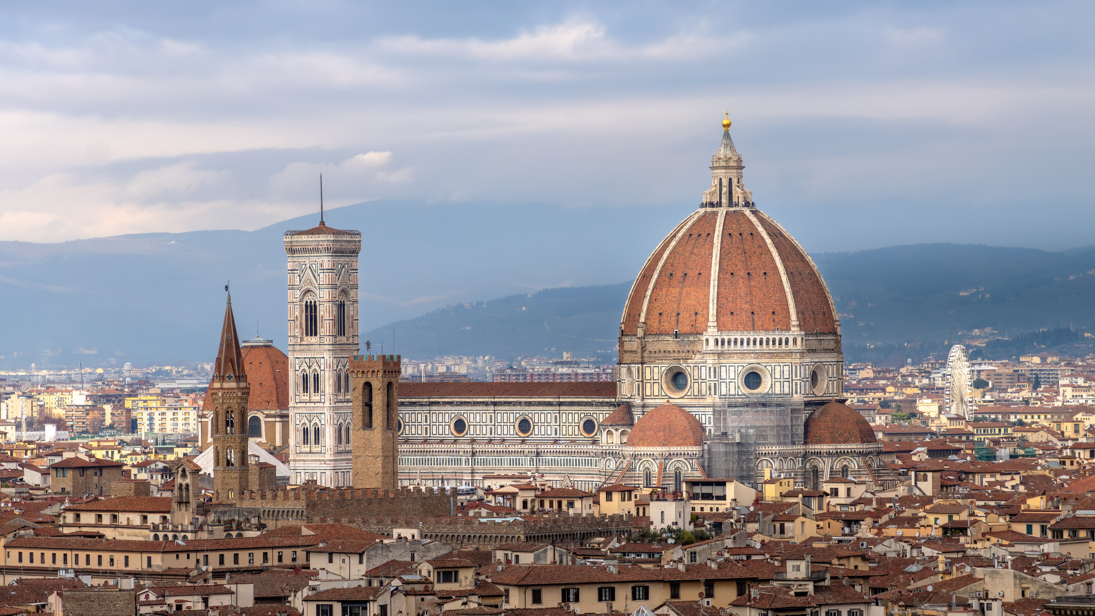 Adorn your screen with the beauty of Florence's cityscape in 4K, featuring the iconic Duomo Cathedral in exquisite detail.