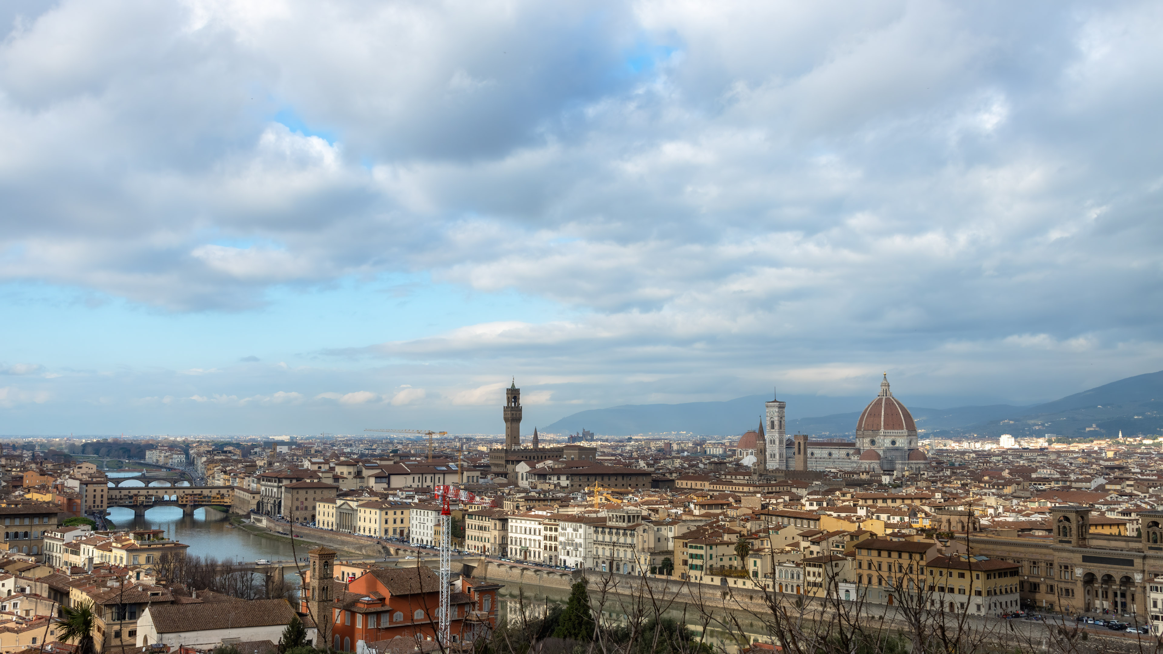 Experience the beauty of Florence with our cityscape wallpaper. Featuring stunning views of the city's famous landmarks and bridges, this wallpaper is the perfect way to bring Florence into your home.
