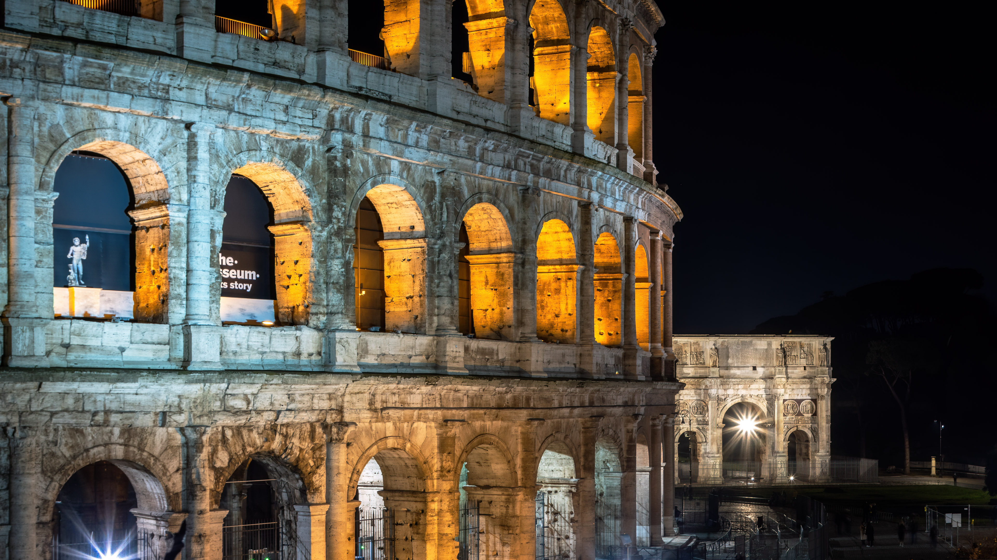 Experience the stunning Rome Colosseum night view wallpaper on your device