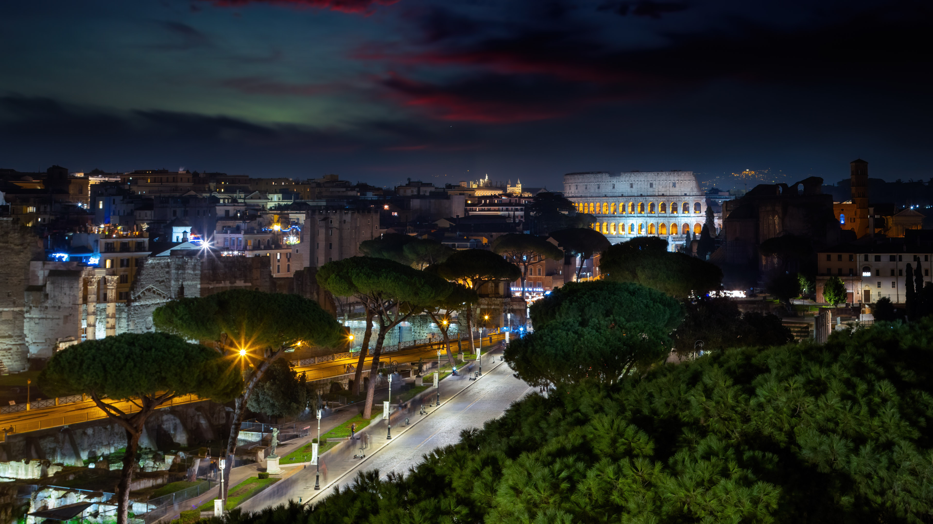 Enjoy the vibrant Rome night city lights wallpaper on your device