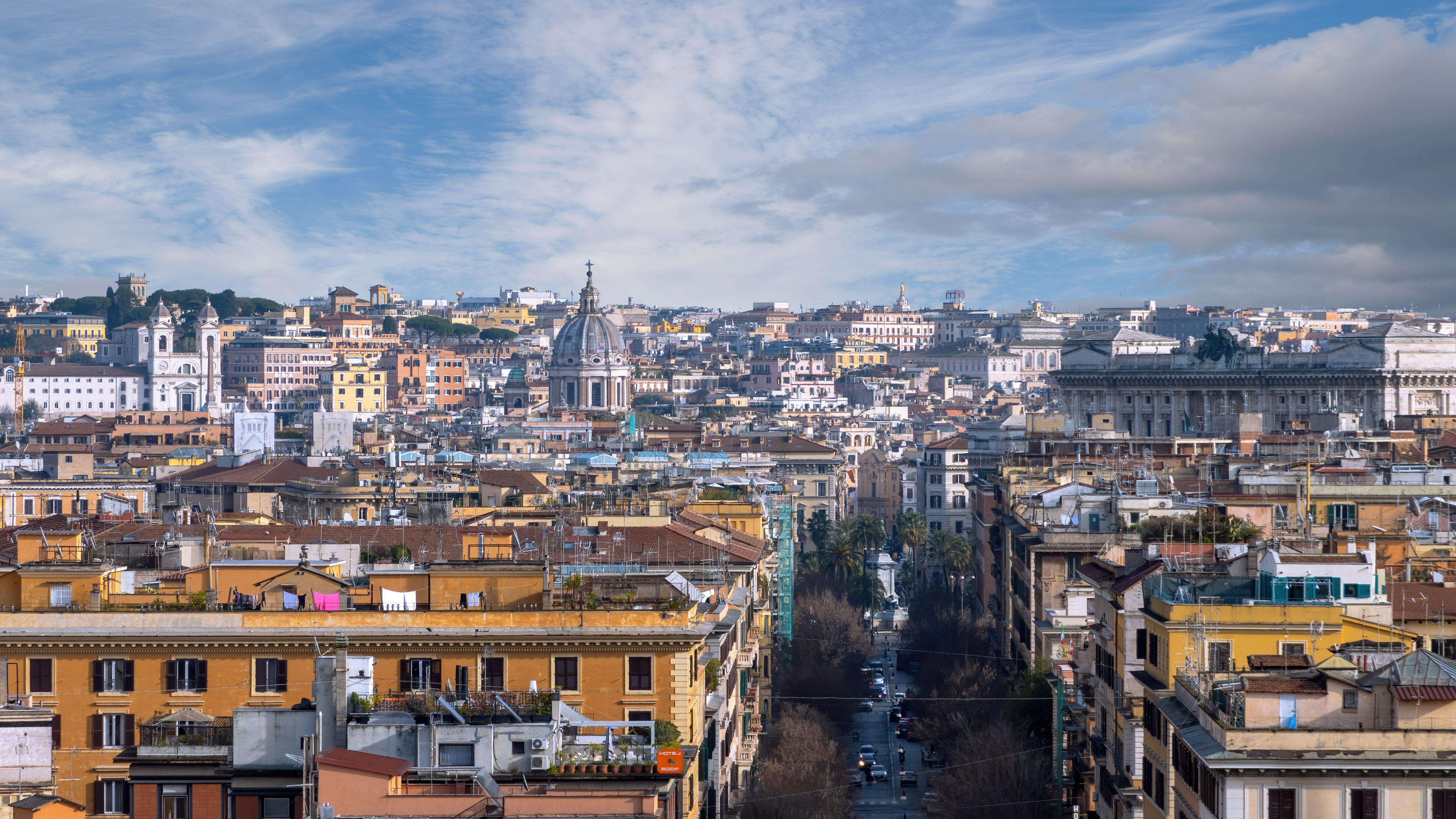 A colorful cityscape wallpaper of Rome's urban landscape.