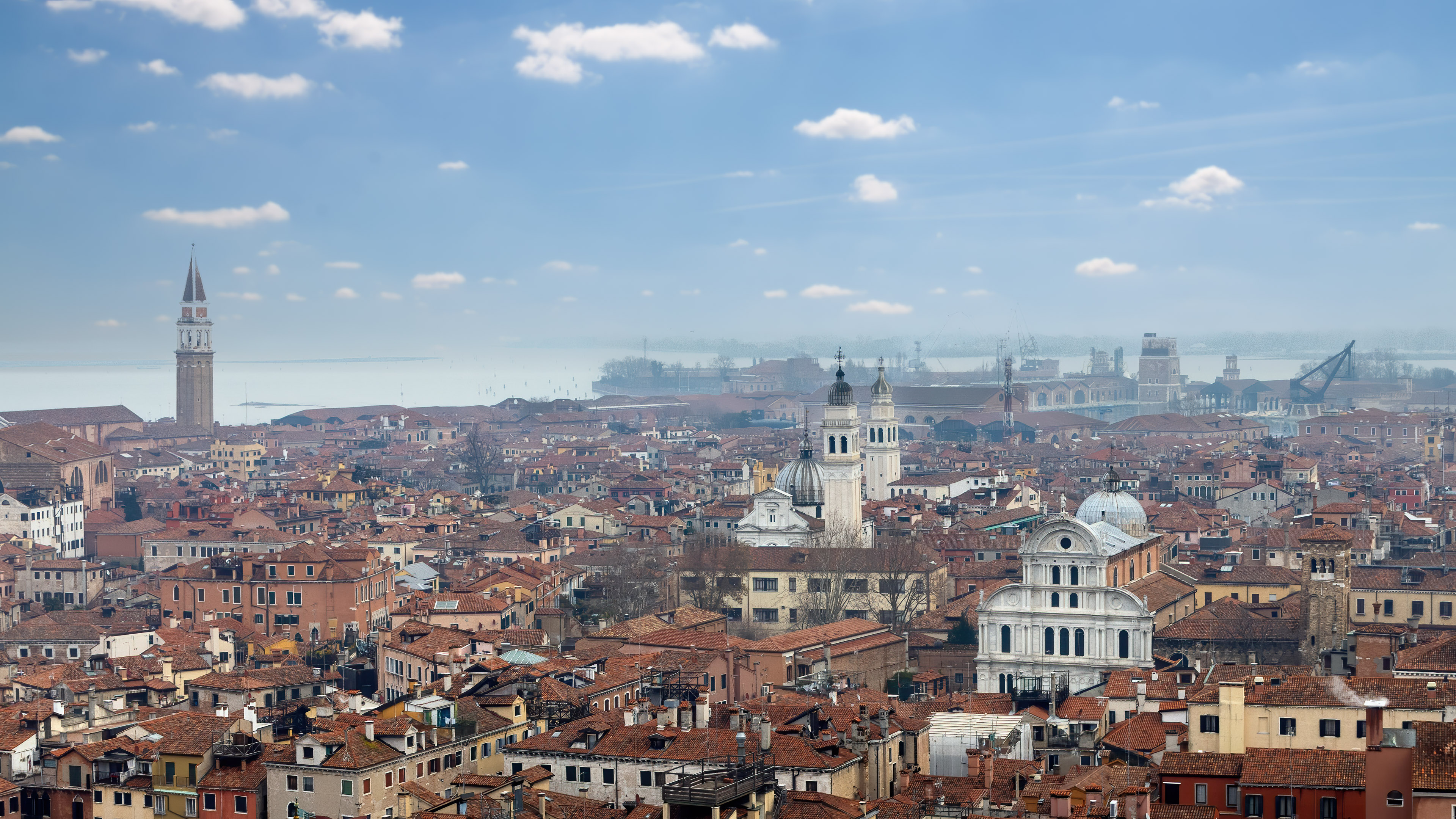 Enjoy the breathtaking view of Venice's skyline with this stunning cityscape wallpaper. Featuring the city's iconic landmarks and canals, this wallpaper is perfect for those who love the charm and beauty of Venice.