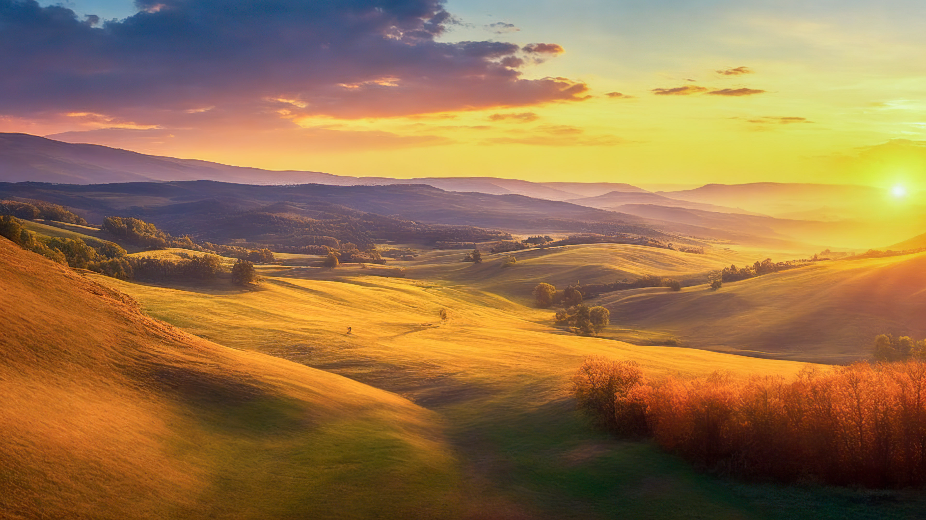 Bring the beauty of a breathtaking sunrise over a tranquil countryside, with rolling hills and a warm, golden glow, to your device with our HD nature wallpaper backgrounds, and let your screen transport you to a serene morning in the countryside.