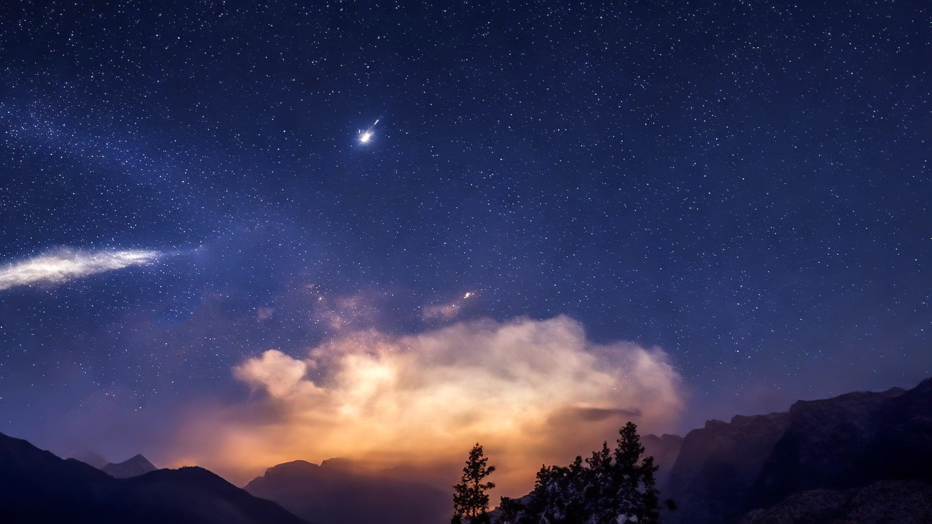 Transformez l'écran de votre appareil avec notre fond d'écran de nature bleu ciel, présentant une pluie de météores ardente traversant un ciel de minuit, laissant des traînées éblouissantes de lumière.