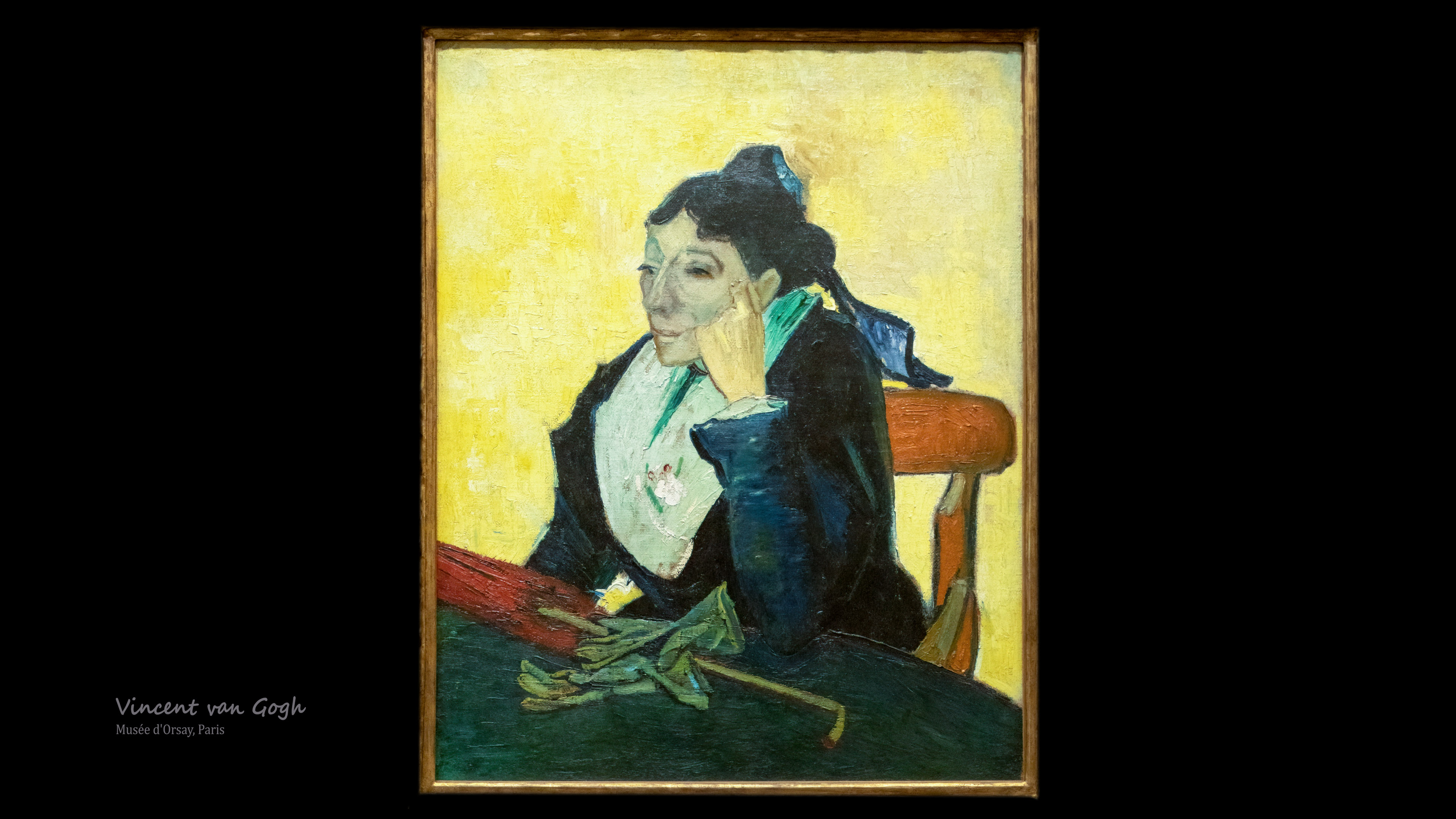 Admire the elegance and charm of L’Arlésienne desktop wallpaper, featuring the portrait of a young woman from Arles that Van Gogh painted in 1890, using bright and contrasting colors.