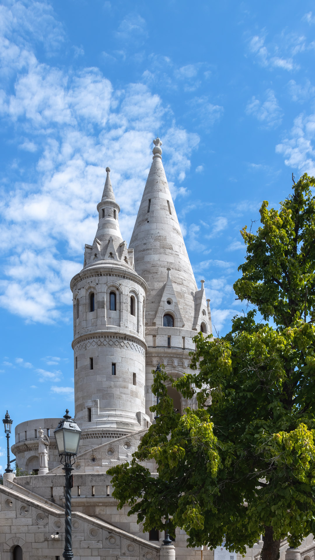 Experience the enchanting beauty of Budapest with our free wallpaper featuring the stunning Fisherman's Bastion.