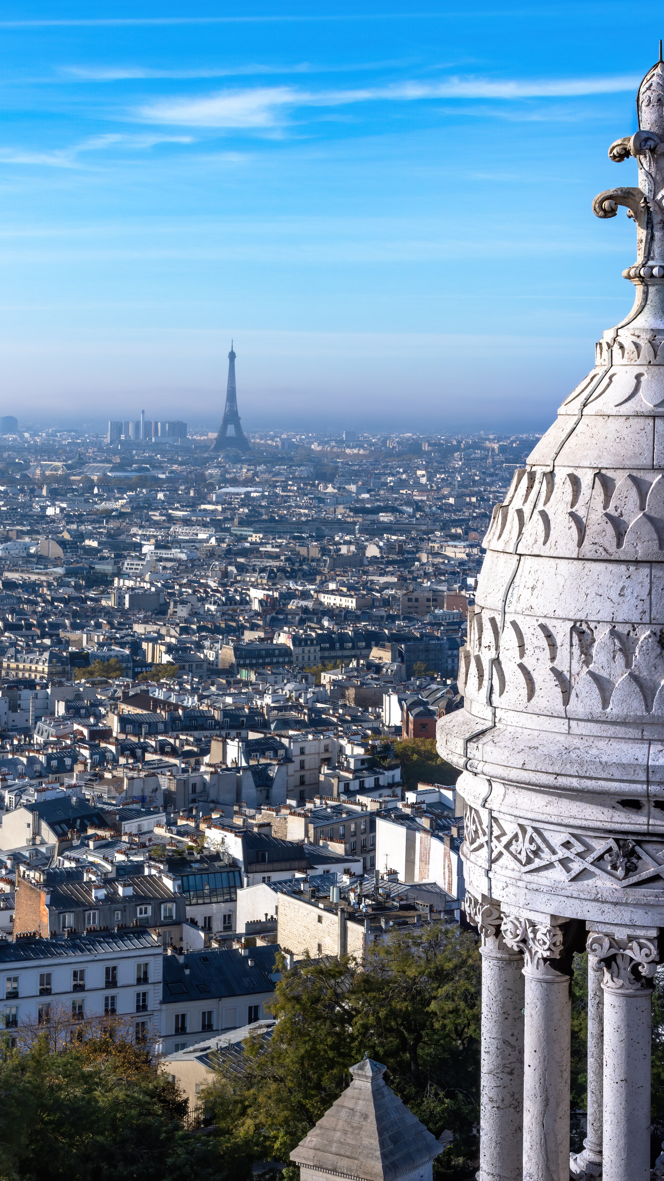 Stunning cityscape wallpaper of Paris featuring the iconic Eiffel Tower in the background.