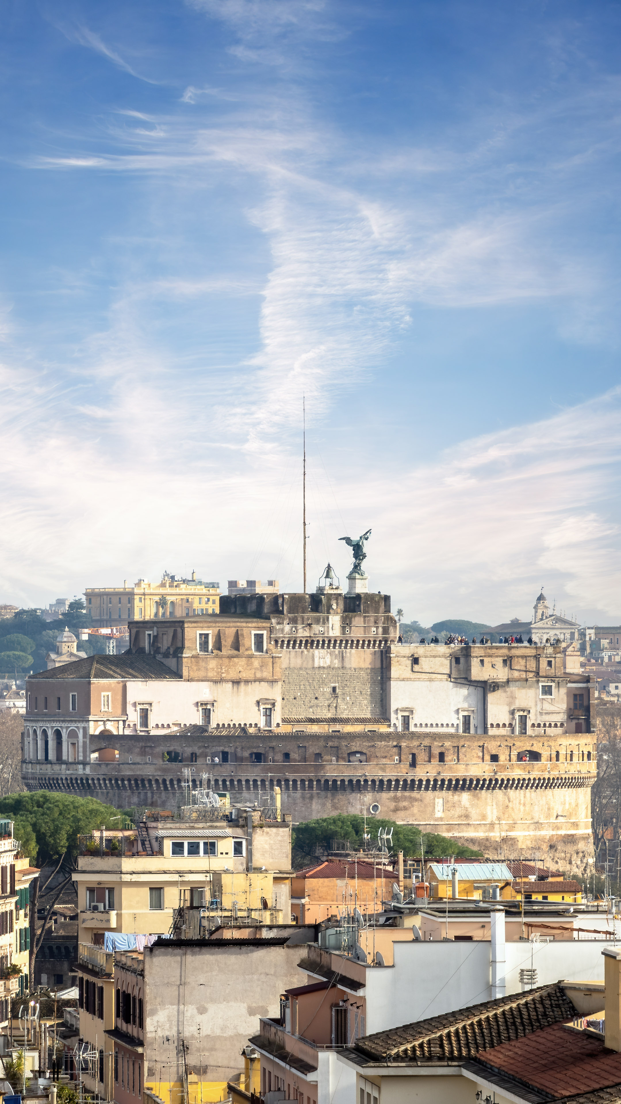 A panoramic cityscape wallpaper of Rome with the Tiber River and Castel Sant'Angelo in view.