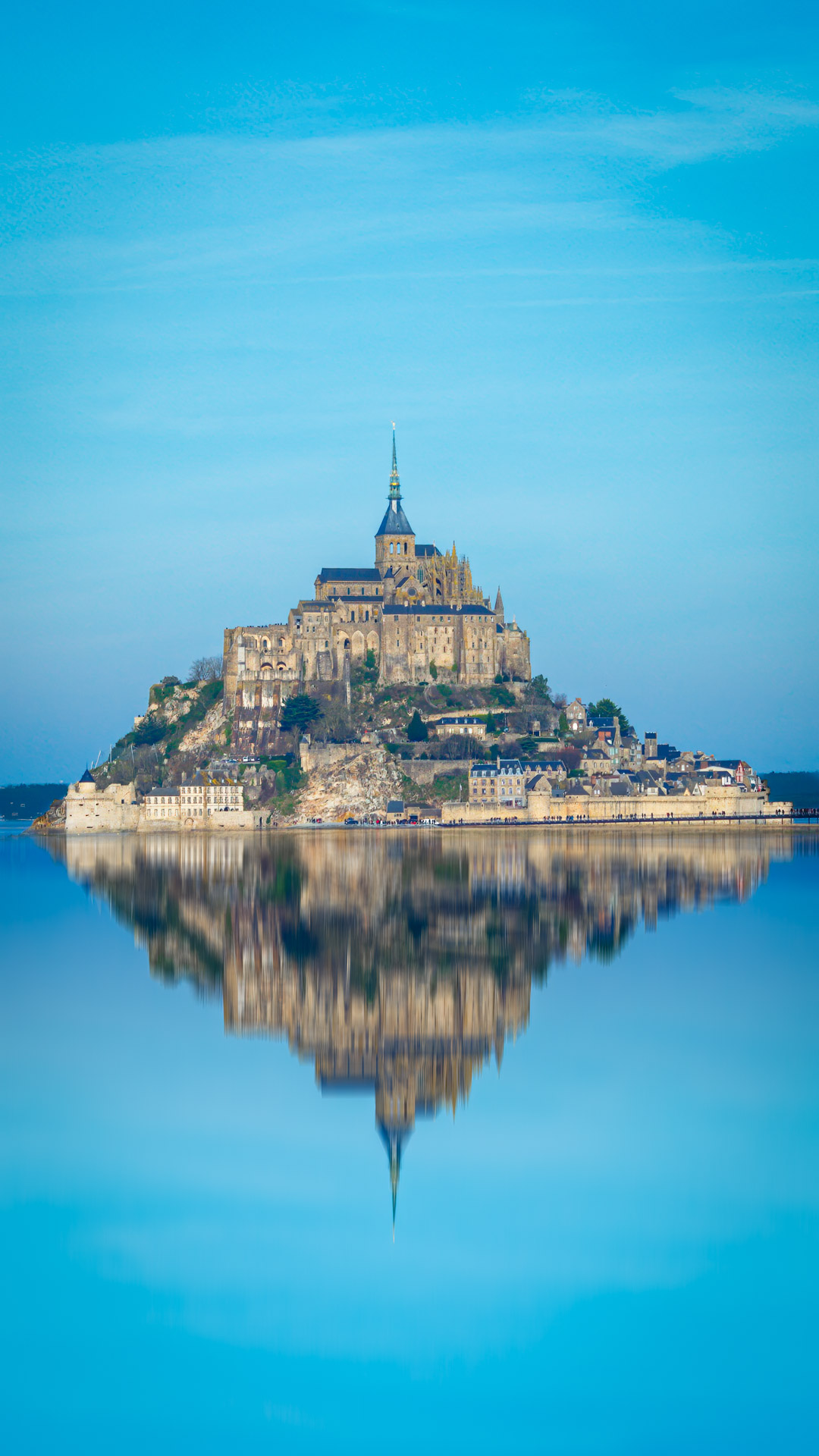 Transport your phone screen to the enchanting landscapes of Mont Saint Michel in France with our captivating city wallpaper.