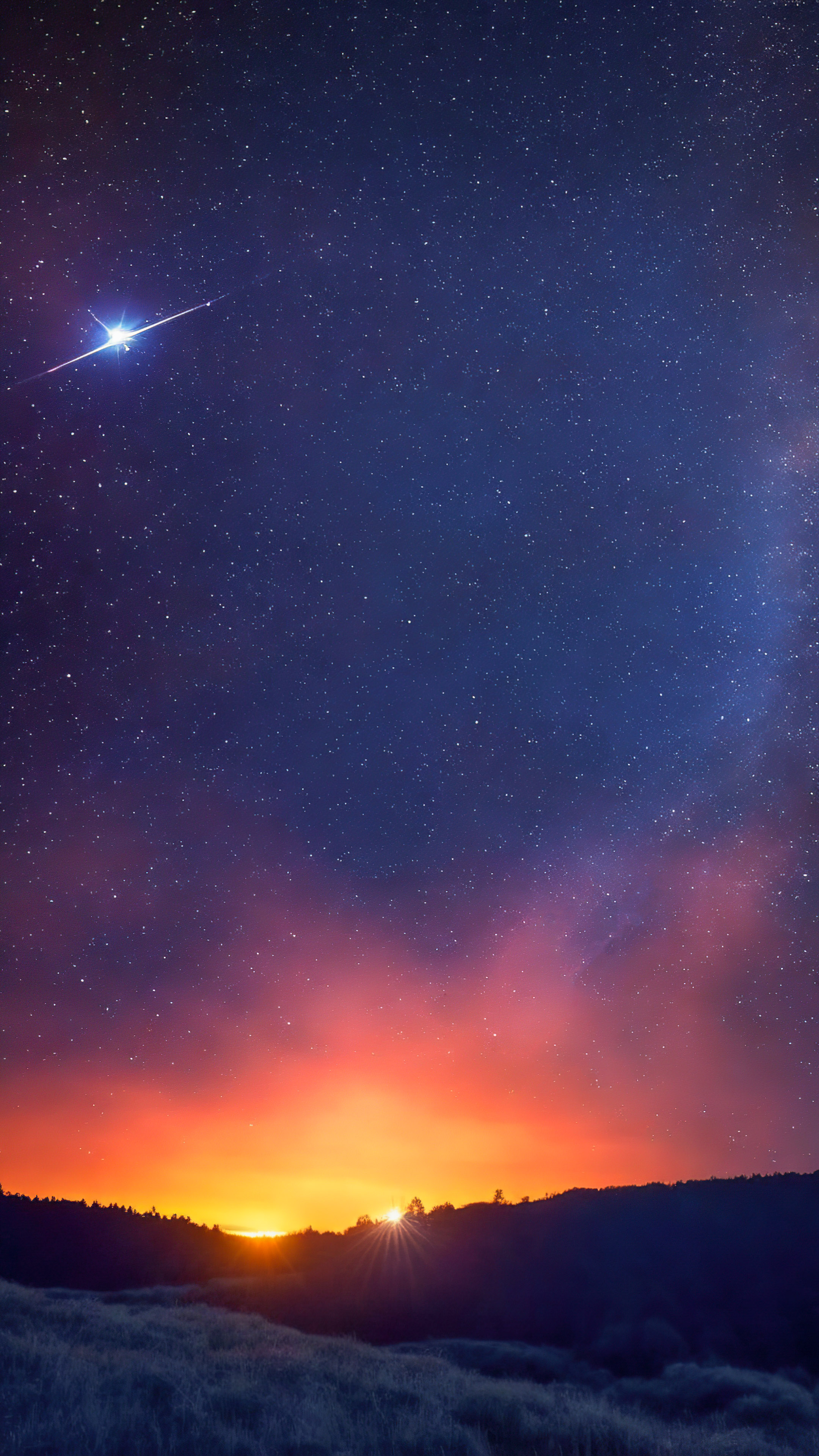 Laissez-vous hypnotiser par notre fond d'écran de nuit étoilée noire, illustrant une pluie de météores enflammée traversant un ciel de minuit, laissant des traînées éblouissantes de lumière.