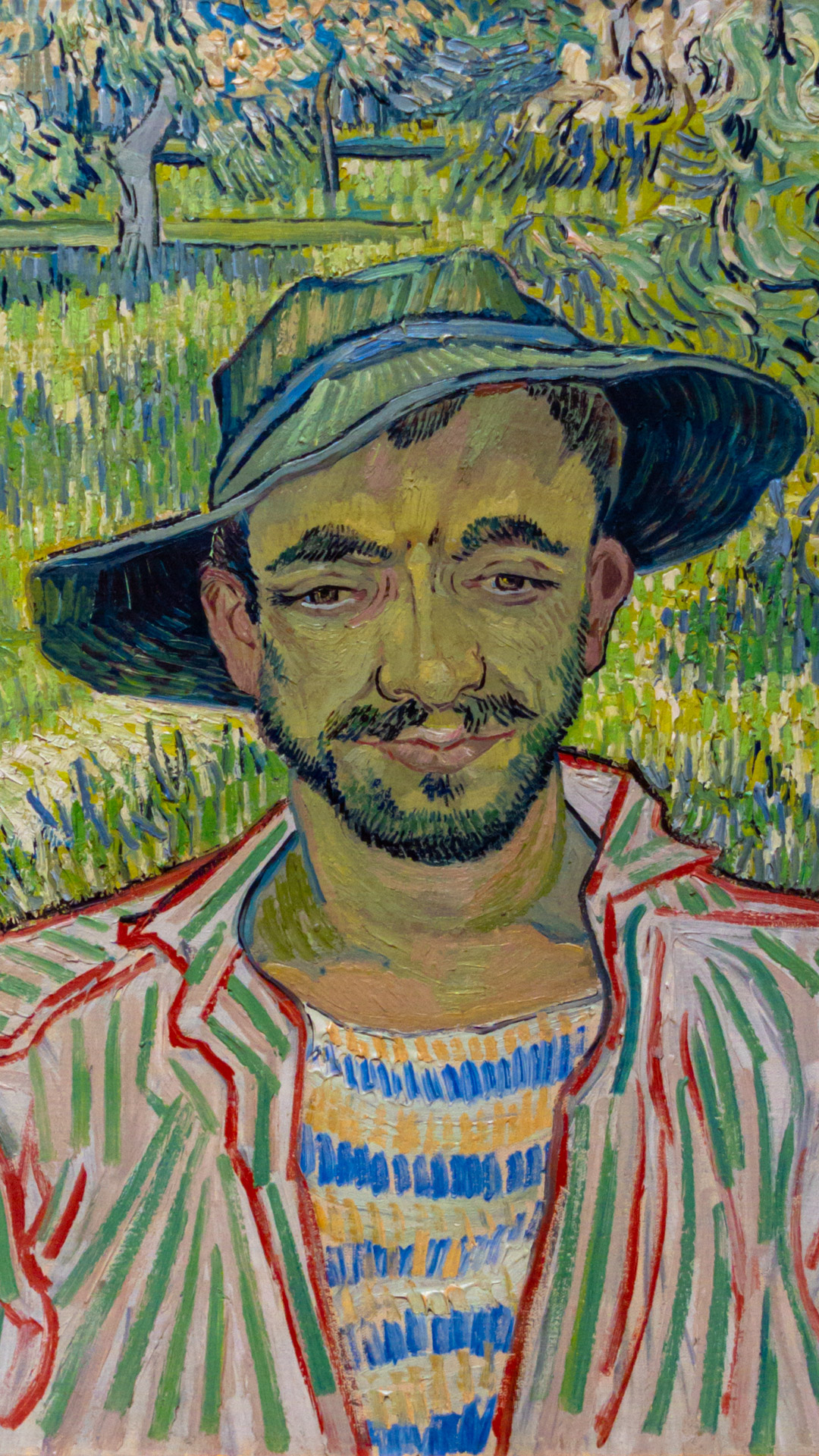 Immerse yourself in the passion and intensity of Van Gogh’s art with a painting wallpaper portraying a Young Peasant